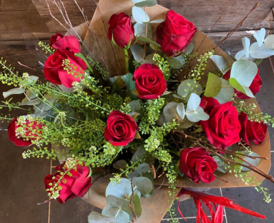 12 Red Roses - 12 Red Roses with foliage in a handtied